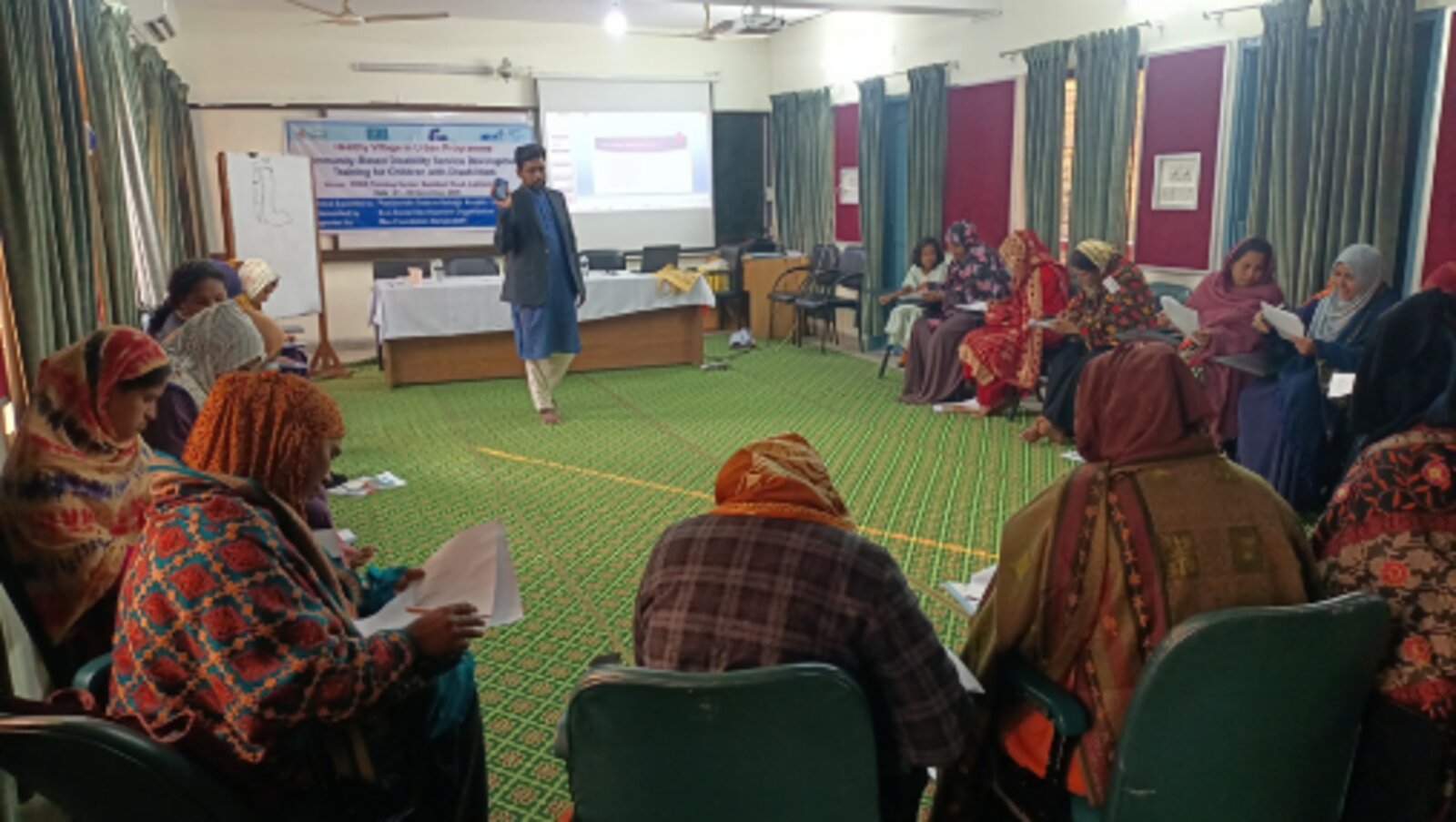 Consultant conducting practical training session